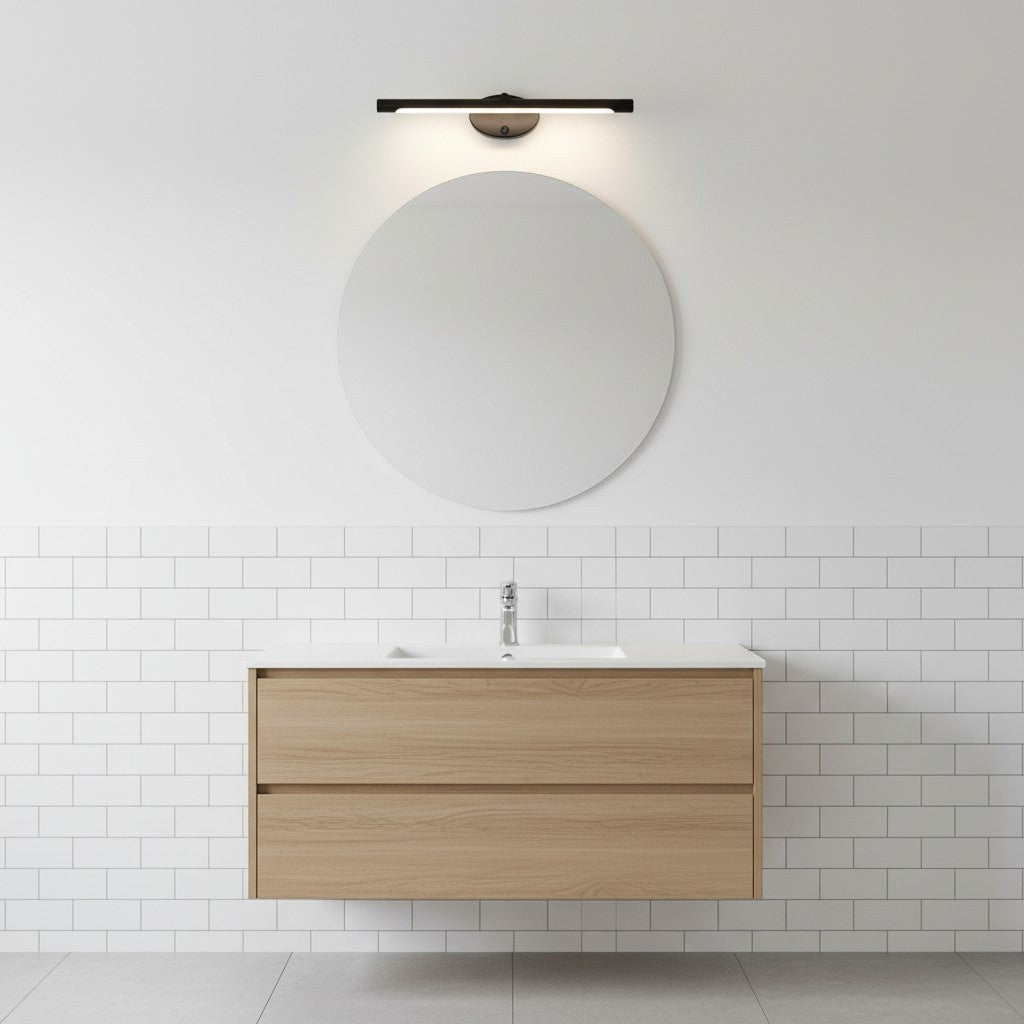 GoldenWatt LED bathroom mirror wall sconce in black and gold with downward lighting mounted above a round vanity mirror