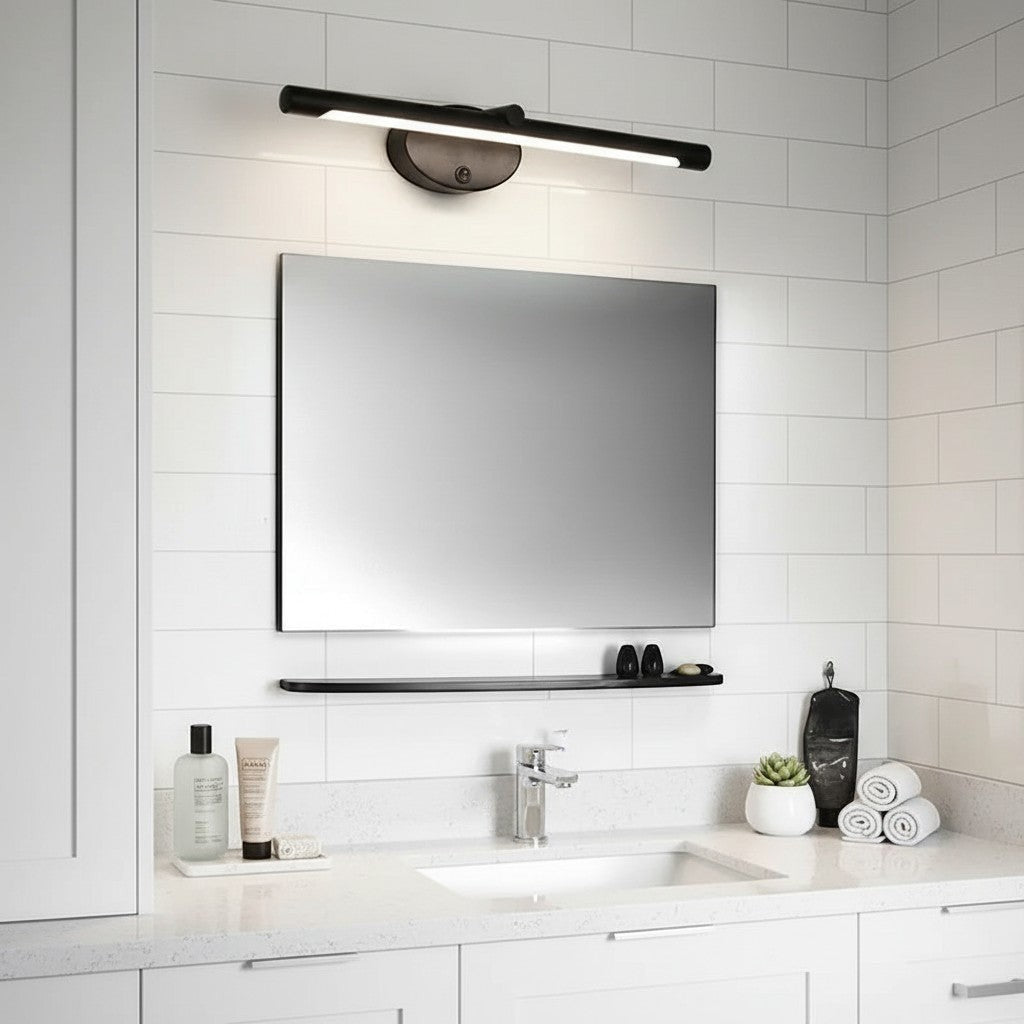 GoldenWatt LED bathroom mirror wall sconce in black and gold with touch switch mounted above a vanity mirror