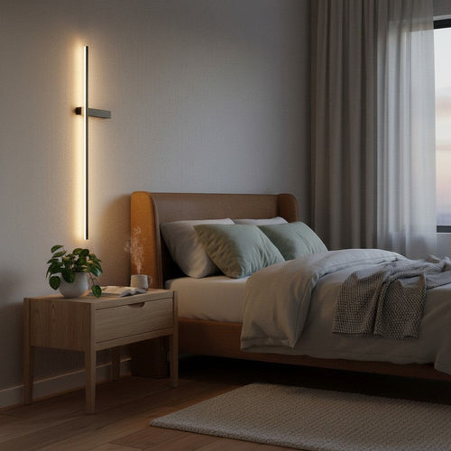 GoldenWatt dimmable LED strip wall sconce with a minimalist iron design, illuminating a modern bedroom bedside wall.