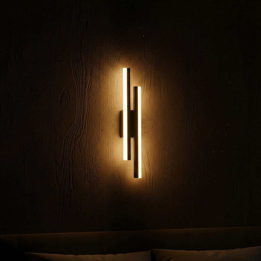 GoldenWatt dimmable LED wall sconce in black with warm glowing acrylic light strips mounted on a dark textured wall