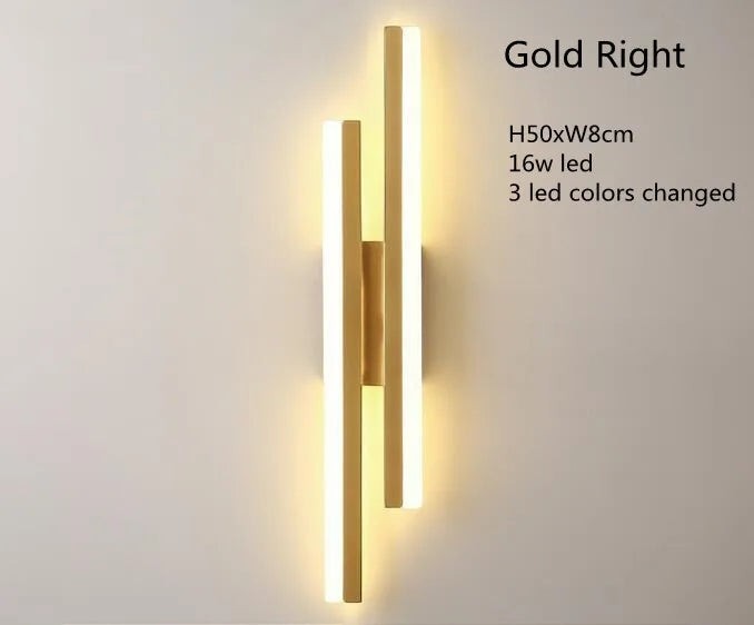 GoldenWatt dimmable gold LED wall sconce with a modern iron and acrylic linear design for bedroom or living room lighting.