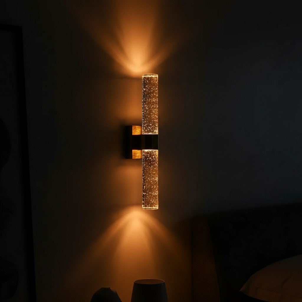 GoldenWatt 12W LED wall sconce with gold-plated frame and crystal-effect glass casting warm up and down light.