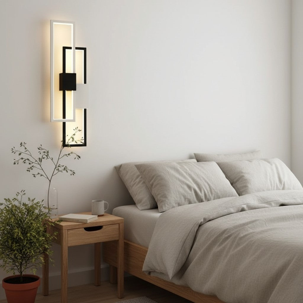 GoldenWatt modern rectangular LED wall lamp with black and white iron frame and acrylic shade in a minimalist bedroom