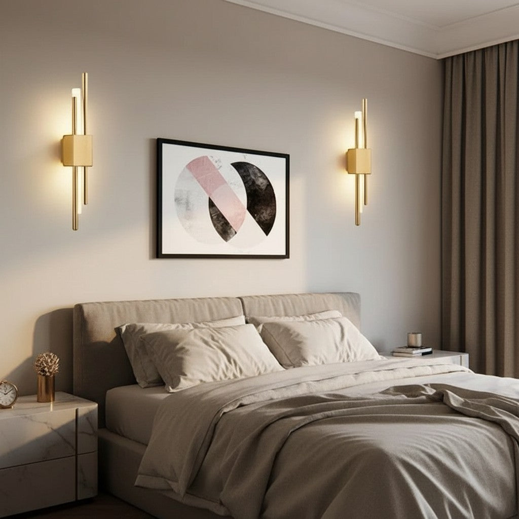 GoldenWatt Nordic LED wall sconces in gold finish mounted on a bedroom wall, providing warm ambient lighting.