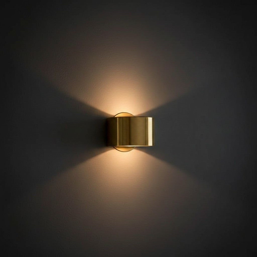 GoldenWatt Nordic modern gold iron wall sconce emitting warm white light against a dark wall