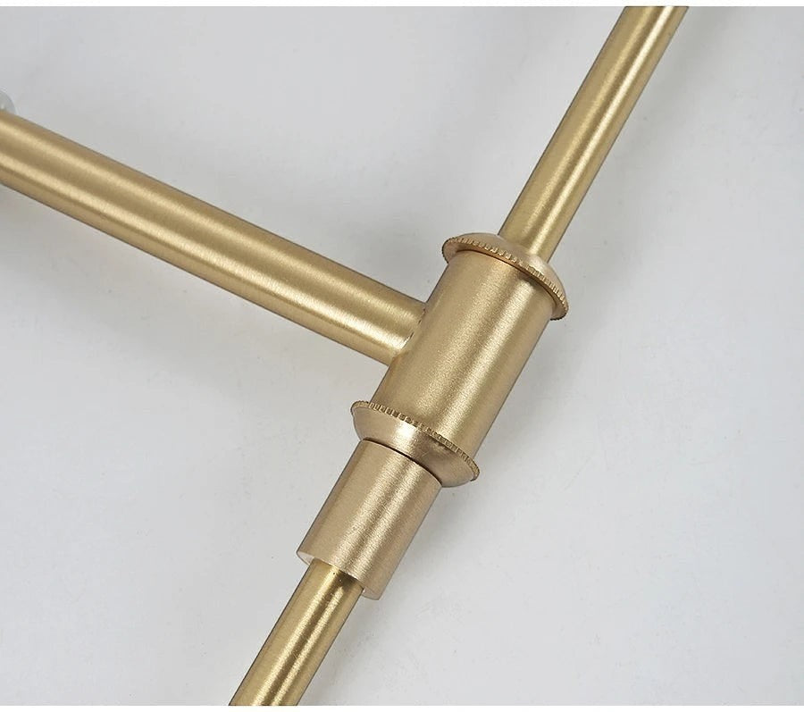 GoldenWatt retro copper wall lamp featuring a detailed forged iron joint and elegant gold finish close-up