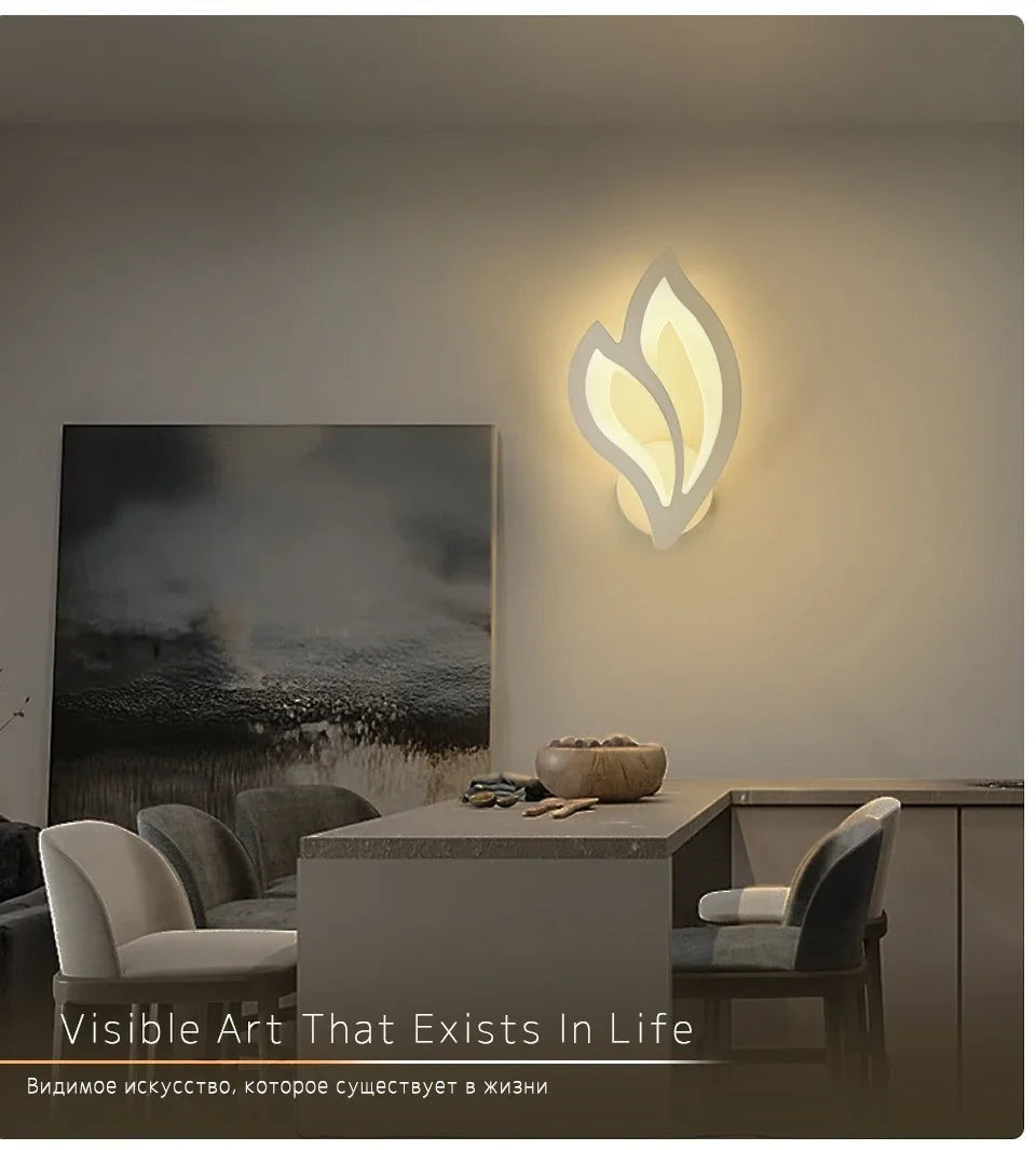 GoldenWatt modern white LED wall sconce with leaf-shaped acrylic shade providing warm up and down lighting in a dining room