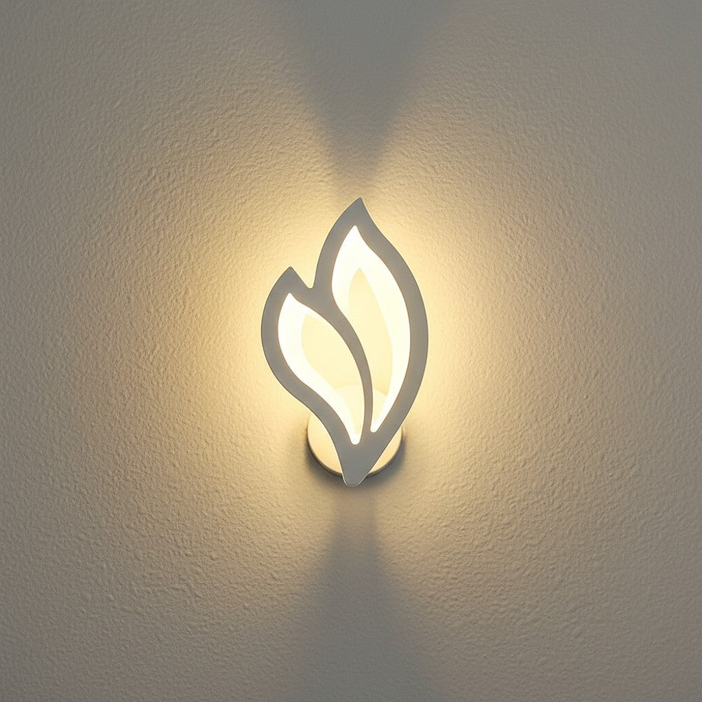 GoldenWatt modern white LED wall sconce with a leaf-shaped acrylic shade and warm up and down lighting on a wall